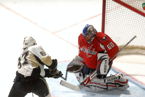Sidney Crosby takes a shot on net against Jose Theodore of the Washington Capitals on 3/8/09