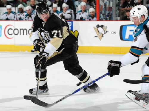 Evgeni Malkin takes a backhand shot