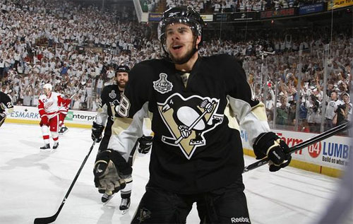 Tyler Kennedy celebrates after scoring what would be the game winning goal