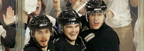 Kris Letang, Chris Kunitz, and Evgeni Malkin