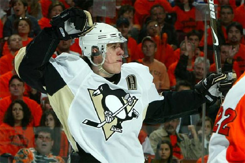 Evgeni Malkin celebrates one of his goals against the Flyers on Sunday