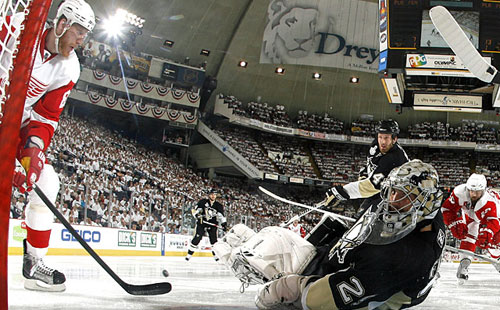 Marc-Andre Fleury kicks away a shot by Marian Hossa of the Red Wings during Game 3 of the 2009 NHL Stanley Cup Finals on June 2, 2009 at Mellon Arena.