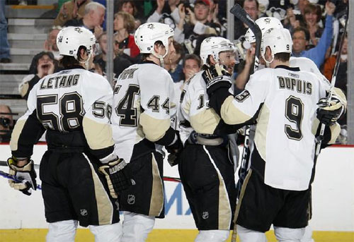 The Penguins Celebrate Petr Sykora's go ahead goal.